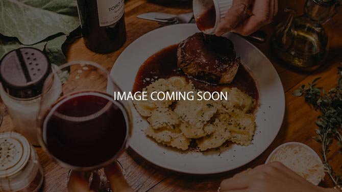 Where is SkyBox Rooftop Bar located?